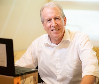 Chaplain Bob Barrett at computer